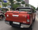 Toyota Hilux  G 3.0AT 4x4 2015 - Bán xe Toyota Hilux G 3.0AT 4x4 đời 2015, màu đỏ 