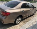 Toyota Corolla altis 2010 - Bán ô tô Toyota Corolla Altis đời 2010, màu nâu, 415tr