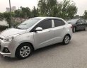 Hyundai Grand i10 2015 - Cần bán gấp Hyundai Grand i10 đời 2015, màu bạc, giá 328tr