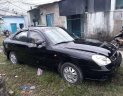 Daewoo Nubira 2002 - Bán Daewoo Nubira đời 2002, màu đen còn mới, giá 95tr