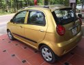 Chevrolet Spark LT 2009 - Bán Chevrolet Spark LT năm 2009, màu vàng