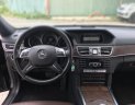 Mercedes-Benz E class E200 2014 - Bán xe Mercedes E200 sản xuất 2014, màu đen một chủ mua mới