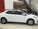 Toyota Corolla altis 1.8E CVT 2018 - Bán ô tô Toyota Corolla Altis 1.8E CVT sản xuất 2018, màu trắng, giá 707tr