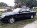 Daewoo Nubira 2002 - Bán Daewoo Nubira đời 2002, màu đen còn mới, giá 95tr