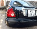 Ford Laser 2003 - Cần bán xe Ford Laser sản xuất 2003, màu đen chính chủ, 180tr