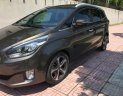 Kia Rondo 2015 - Bán Kia Rondo 1.7L máy dầu ECO rất tiết kiệm, số tự động, màu nâu coffe, Sx cuối 2015