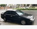 Kia Spectra 2005 - Cần bán gấp Kia Spectra năm sản xuất 2005, màu đen, giá chỉ 175 triệu