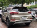 Hyundai Tucson 1.6 Tubor 2017 - Cần bán Hyundai Tucson 1.6 Tubor năm 2017, màu vàng