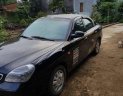 Daewoo Nubira    2004 - Cần bán gấp Daewoo Nubira đời 2004, màu đen, giá tốt