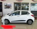 Hyundai Grand i10  1.2 2015 - Cần bán Hyundai Grand i10 năm 2015, màu trắng, số tự động