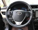 Toyota Corolla altis 1.8 G 2015 - Bán Toyota Corolla altis 1.8 G sản xuất 2015, màu đen