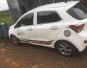 Hyundai Grand i10   1.0MT 2014 - Cần bán gấp Hyundai Grand i10 1.0MT sản xuất năm 2014, màu trắng  