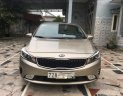 Kia Cerato AT 2016 - Cần bán Kia Cerato AT sản xuất 2016, màu nâu 