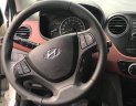 Hyundai Grand i10  1.2 2016 - Bán Hyundai Grand i10 năm sản xuất 2016, màu trắng số tự động