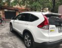 Honda CR V 2.4 at 2014 - Em bán xe Honda CR-V 2.4 AT sx 2014 màu trắng tư nhân chính chủ, xe sơn zin 95%, lốp 5 quả theo xe