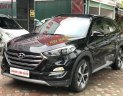 Hyundai Tucson 1.6 Turbo  2016 - Bán Hyundai Tucson 1.6 Turbo năm 2016, màu đen, giá 940tr