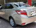 Toyota Vios  E 2017 - Bán Toyota Vios E đời 2017, màu vàng cát