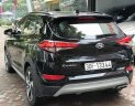 Hyundai Tucson 1.6 Turbo  2016 - Bán Hyundai Tucson 1.6 Turbo năm 2016, màu đen, giá 940tr