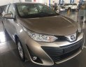 Toyota Vios 1.5E CVT 2018 - Bán xe Toyota Vios 1.5E CVT màu nâu, tăng gói bảo dưỡng 20.000km, hỗ trợ trả góp 90% giá xe. LH: 0912493498