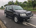 Ford Escape 2.3 2004 - Bán ô tô Ford Escape sản xuất 2004 màu đen, 235 triệu