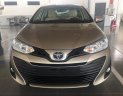 Toyota Vios 1.5E CVT 2018 - Bán xe Toyota Vios 1.5E CVT màu nâu, tăng gói bảo dưỡng 20.000km, hỗ trợ trả góp 90% giá xe. LH: 0912493498