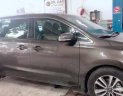 Kia Sedona 2017 - Cần bán lại xe Kia Sedona sản xuất 2017, màu xám còn mới