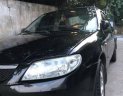 Mazda 323 2004 - Gia đình bán Mazda 323 2004, màu đen, 150tr