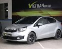 Kia Rio 1.4MT 2015 - Cần bán gấp Kia Rio 1.4MT sản xuất 2015, màu bạc