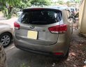 Kia Rondo GAT 2016 - Bán xe Kia Rondo 2016 số auto, màu vàng cát, odo 27.000 km đúng chất