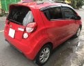 Chevrolet Spark LT MT 2016 - Bán Chevrolet Spark LT MT năm sản xuất 2016, màu đỏ số sàn, giá tốt