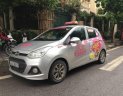 Hyundai Grand i10  MT 2014 - Bán xe Hyundai Grand i10 MT đời 2014, màu bạc, xe đẹp không lỗi lầm