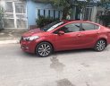 Kia K3 G 2015 - Gia đình cần bán Kia K3, sx 2015, số tự động màu đỏ, động cơ 2.0