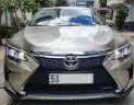 Toyota Camry   2016 - Cần bán gấp Toyota Camry sản xuất năm 2016, màu vàng còn mới giá cạnh tranh