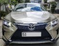 Toyota Camry AT 2016 - Bán Toyota Camry AT đời 2016 màu vàng cát, mới 99%