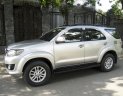 Toyota Fortuner V 2015 - Bán Toyota Fortuner V model 2015 màu bạc TPHCM