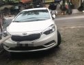 Kia K3   2014 - Bán xe Kia K3 đời 2014, màu trắng số sàn giá cạnh tranh