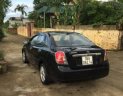 Daewoo Lacetti 2005 - Cần bán xe Daewoo Lacetti 2005, màu đen xe gia đình, giá tốt