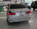 BMW 3 Series 320i 2013 - Cần bán lại xe BMW 320i sản xuất năm 2013, màu trắng, nhập khẩu nguyên chiếc, 888tr