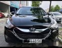 Hyundai Tucson 2.0 4WD 2011 - Cần bán Hyundai Tucson 2.0 4WD năm sản xuất 2011, màu đen, nhập khẩu Hàn Quốc