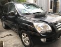 Kia Sportage  MT 2006 - Cần bán lại xe Kia Sportage MT sản xuất 2006, màu đen như mới, giá 295tr