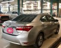 Toyota Corolla altis 1.8G MT 2016 - Cần bán Toyota Corolla altis 1.8G MT 2016, màu bạc số sàn, giá 665tr