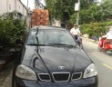 Daewoo Lacetti 2004 - Bán ô tô Daewoo Lacetti sản xuất 2004, màu đen số sàn