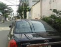 Daewoo Lacetti 2004 - Bán ô tô Daewoo Lacetti sản xuất 2004, màu đen số sàn