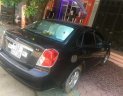 Daewoo Lacetti EX 2009 - Gia đình bán xe Daewoo Lacetti sản xuất 2009 màu đen