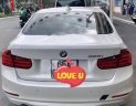 BMW 3 Series 320i 2012 - Bán BMW 320i sản xuất 2012, màu trắng, xe nhập