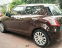 Suzuki Swift 2014 - Bán Suzuki Swift đời 2014, màu nâu, 430tr