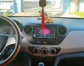 Hyundai Grand i10 2014 - Cần bán lại xe Hyundai Grand i10 sản xuất 2014, màu trắng, biển số Bình Dương