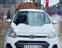 Hyundai Grand i10 2014 - Cần bán lại xe Hyundai Grand i10 sản xuất 2014, màu trắng, biển số Bình Dương