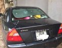 Mitsubishi Lancer 2002 - Cần bán Mitsubishi Lancer sản xuất 2002, màu đen ít sử dụng, giá tốt