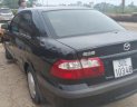 Mazda 626 2001 - Cần bán lại xe Mazda 626 năm sản xuất 2001, màu đen